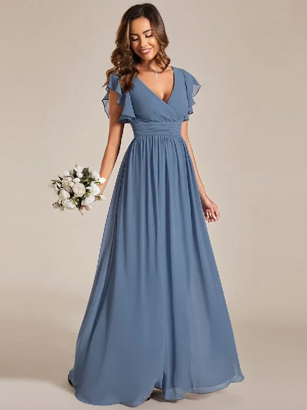 dusty-blue-and-navy-bridesmaid-gowns