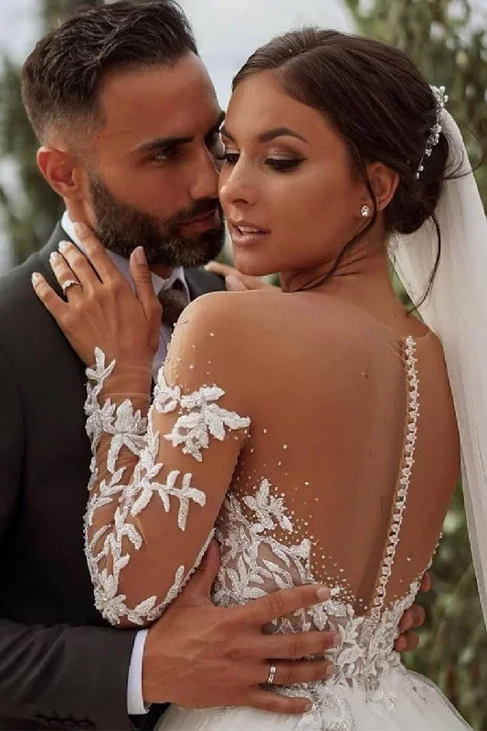 gorgeous-long-sleeves-white-wedding-dress-with-appliques