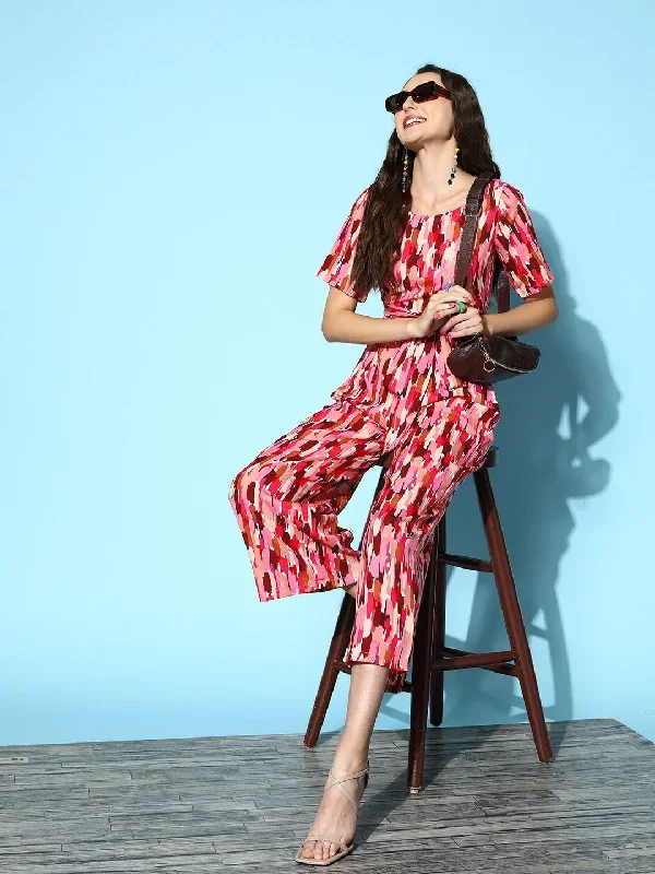 jp3731pk-berrylush-women-pink-abstract-printed-round-neck-tie-up-waist-wide-leg-regular-jumpsuit