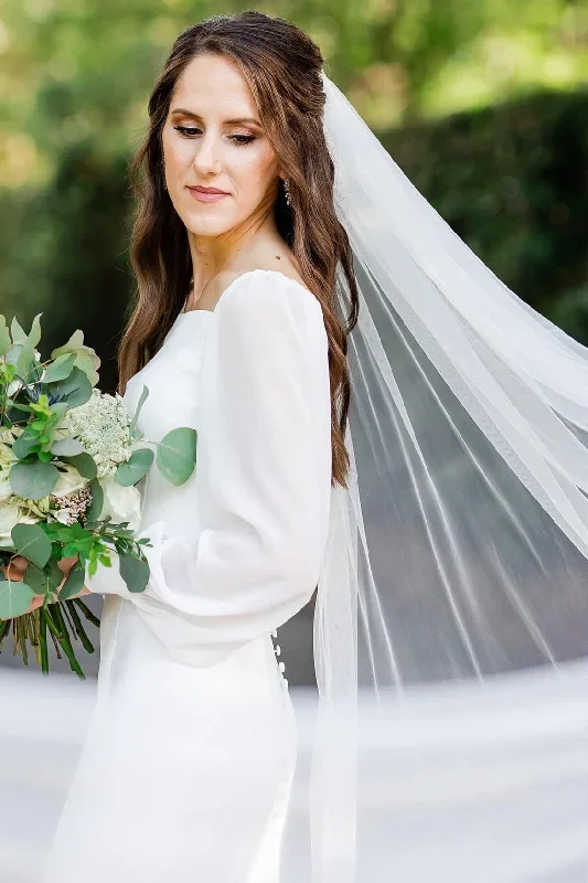 white-long-sleeve-mermaid-long-wedding-dress