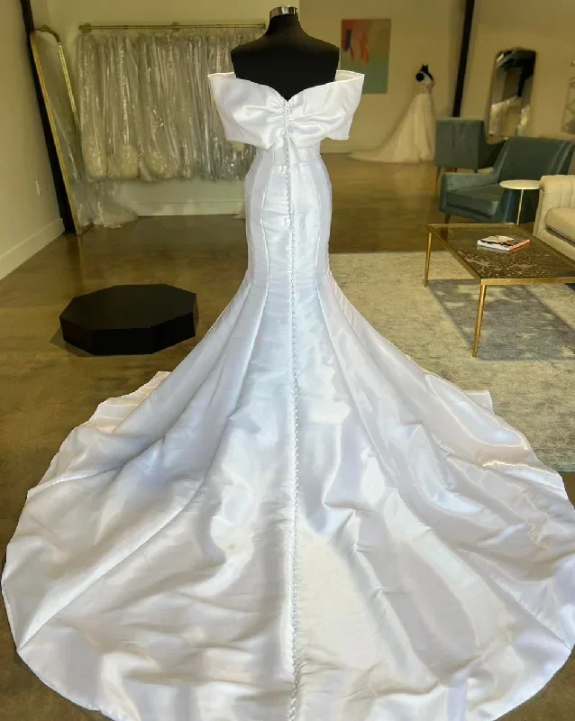 white-off-the-shoulder-bow-trumpet-long-wedding-dress